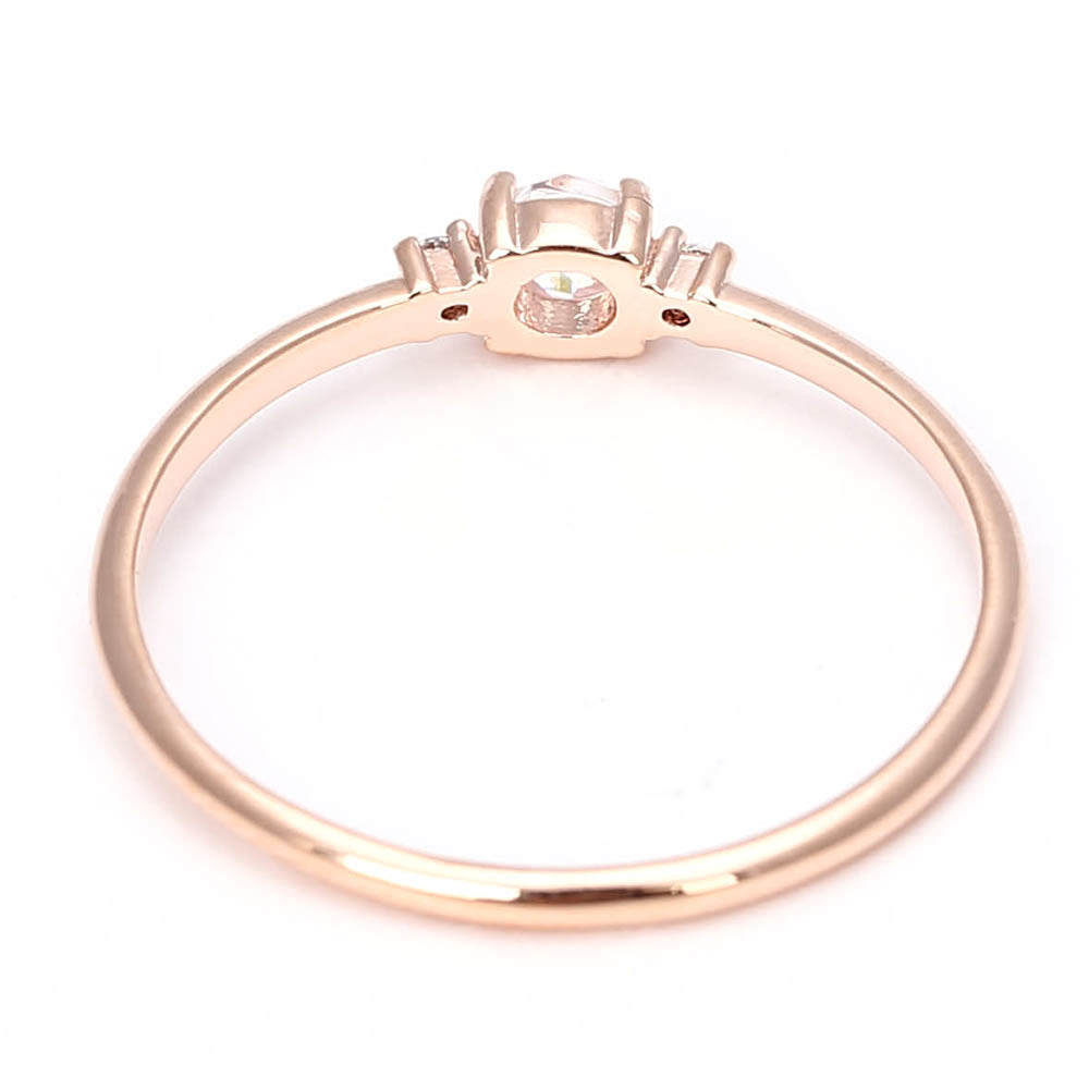 Dainty Rose Gold Solitaire Ring with Side Stones