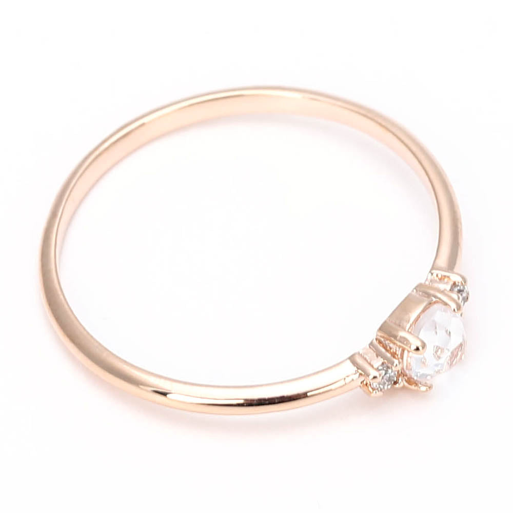 Dainty Rose Gold Solitaire Ring with Side Stones