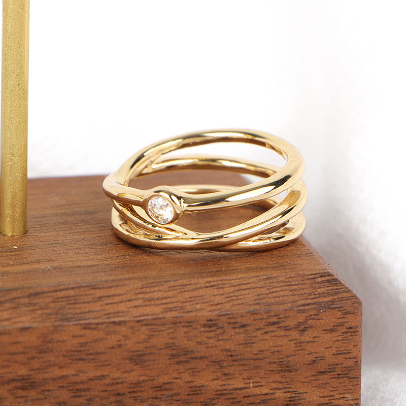 Gold Intertwined Ring with Sparkling Diamond Accent