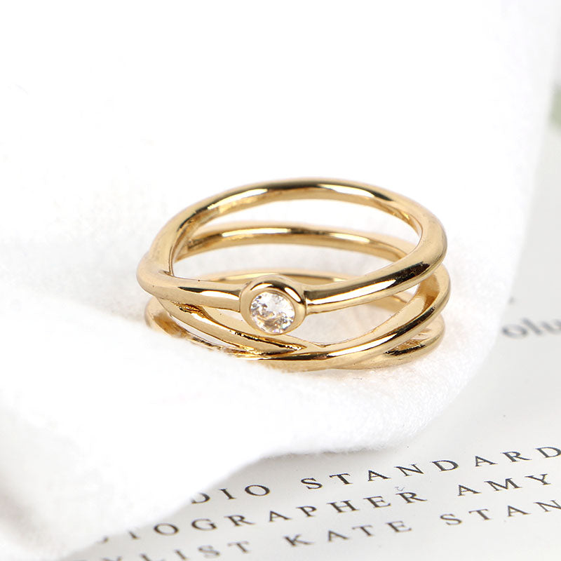 Gold Intertwined Ring with Sparkling Diamond Accent