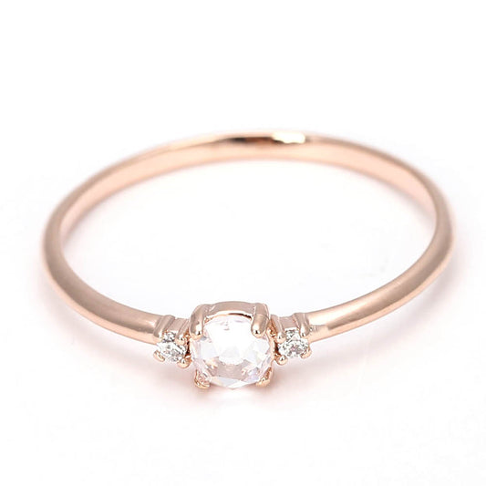 Dainty Rose Gold Solitaire Ring with Side Stones