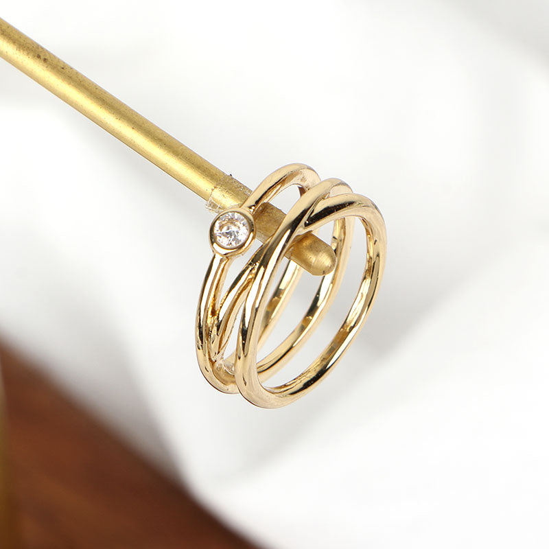 Gold Intertwined Ring with Sparkling Diamond Accent