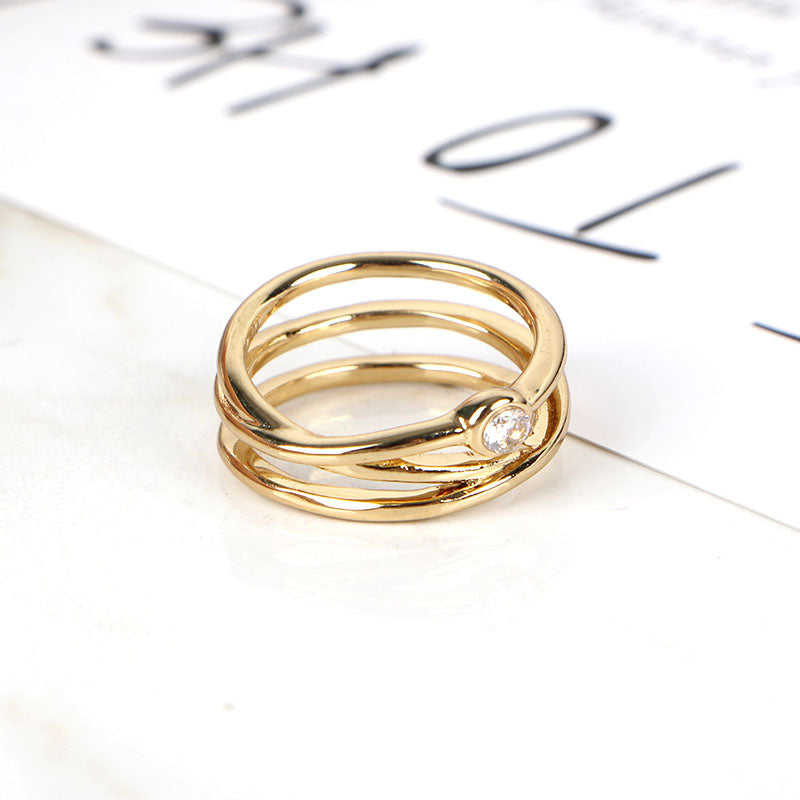 Gold Intertwined Ring with Sparkling Diamond Accent